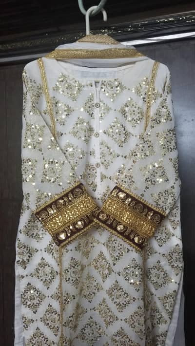 CHIFFON SUIT WITH GOLD AND MAROON EMBROIDERY 