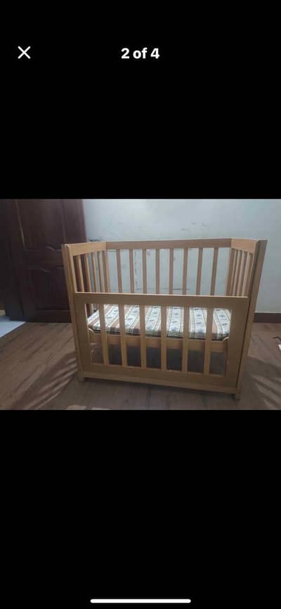 Wooden baby cot