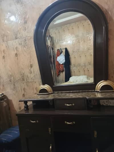 bed with side tables and dressing
