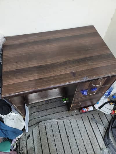 Study Table available for sale with foot rest, condition 9/10.