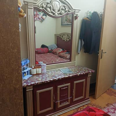 double bed,show Case, dressing table,2 fancy chairs, single bed,iron