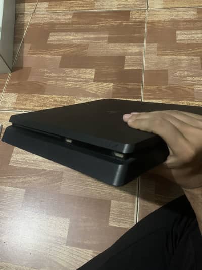 Ps4 slim 1 tb slightly used condition. Non jailbreak