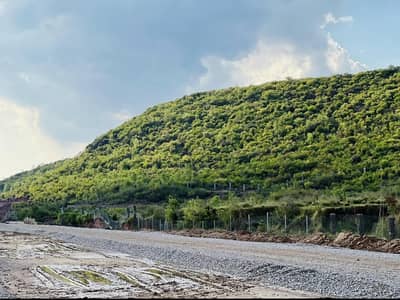 Own a premium 5 Marla plot in one of Islamabad's fastest-growing communities. Ideally located in ME-1, Road 2, this front-open plot offers an excellent opportunity for both investment and future living.