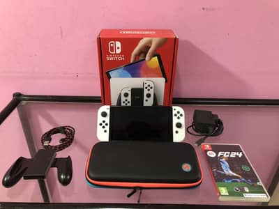 Nintendo switch OLED-with Carrying case, cable and Fc24-Excellent co