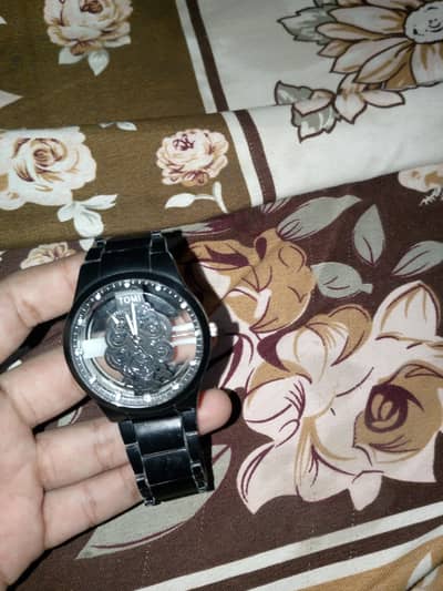 tomi watch