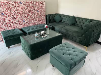 6 seater sofa, 4 seater storage ottoman and center table