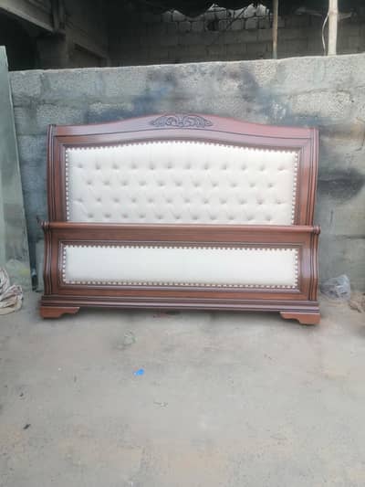 bed with 2 side tables and dressing