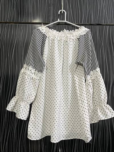 Black and white polka dots shirt