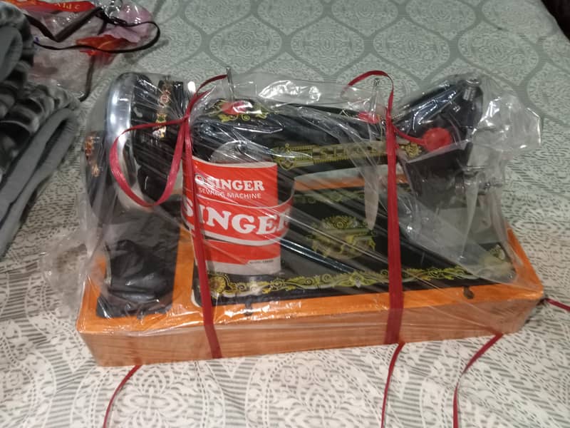 Singeng machine bilkul box pack hai 1