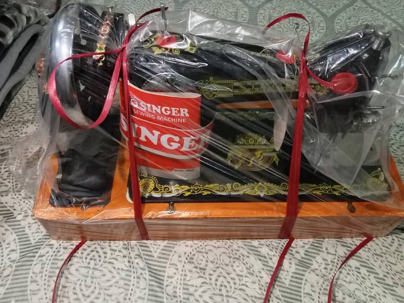 Singeng machine bilkul box pack hai 2