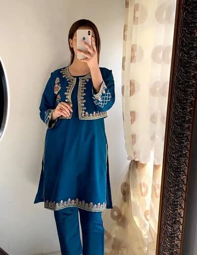 2 Pcs Women's Stitched Linen Embroidered Shirt And Trouser Rs 2,999