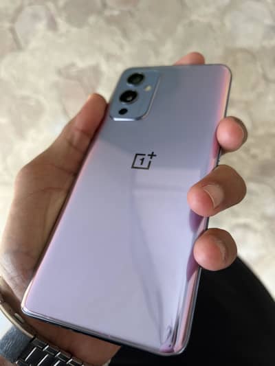One plus 9 12/256 gb pta life time warranty