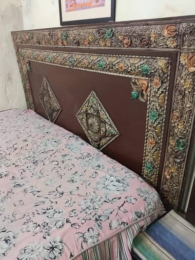 bed with dressing table and cupboard