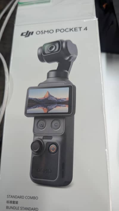 DJI POCKET 4 ( NEVER USED)