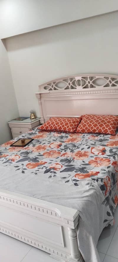 white wooden bed set with matress