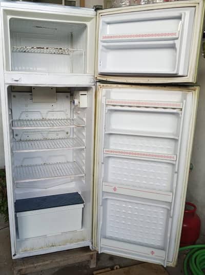 A medium size Indesit Japanese Refrigerator is for sale