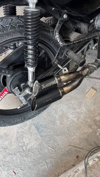 Akrapovic exhaust with bend pipe and complete fitting