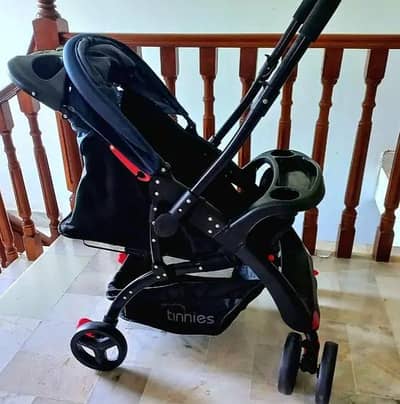 TiNNiES STROLLER/PRAM NEVER USED.