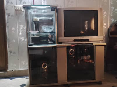 a tv table or a show case and tv