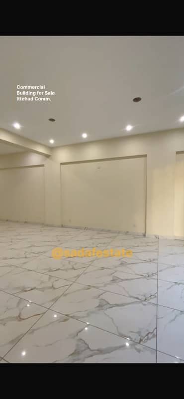COMMERCIAL BUILDING AVAILABLE FOR SALE IN PHASE 6 DHA Karachi with handsome rental income brend New building