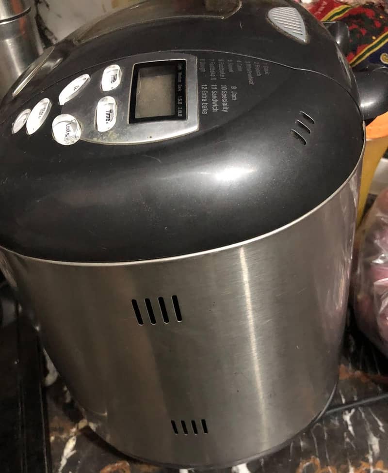 Original morphy richard fast bake bread maker. . . 0
