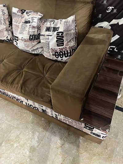 L shaped sofa set with 12 cusions and 2 storage puffies and 4 stoooles