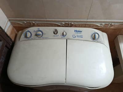 haire washing machine with dryer