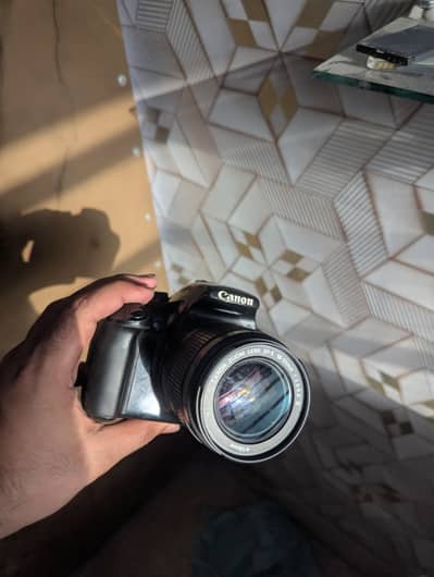 canon 1100d with 18:55mm and 75:300