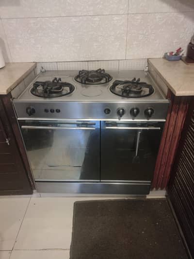 Three Burner cooking range with Hot box and Baking oven.
