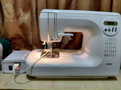 Japanese Juki sewing machine with embroidery patterns