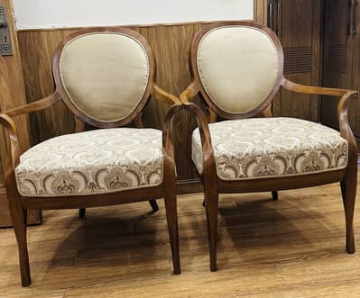 2 room chairs with coffee table. Purchased them from shamoo jee.