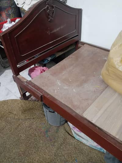 wooden single bed