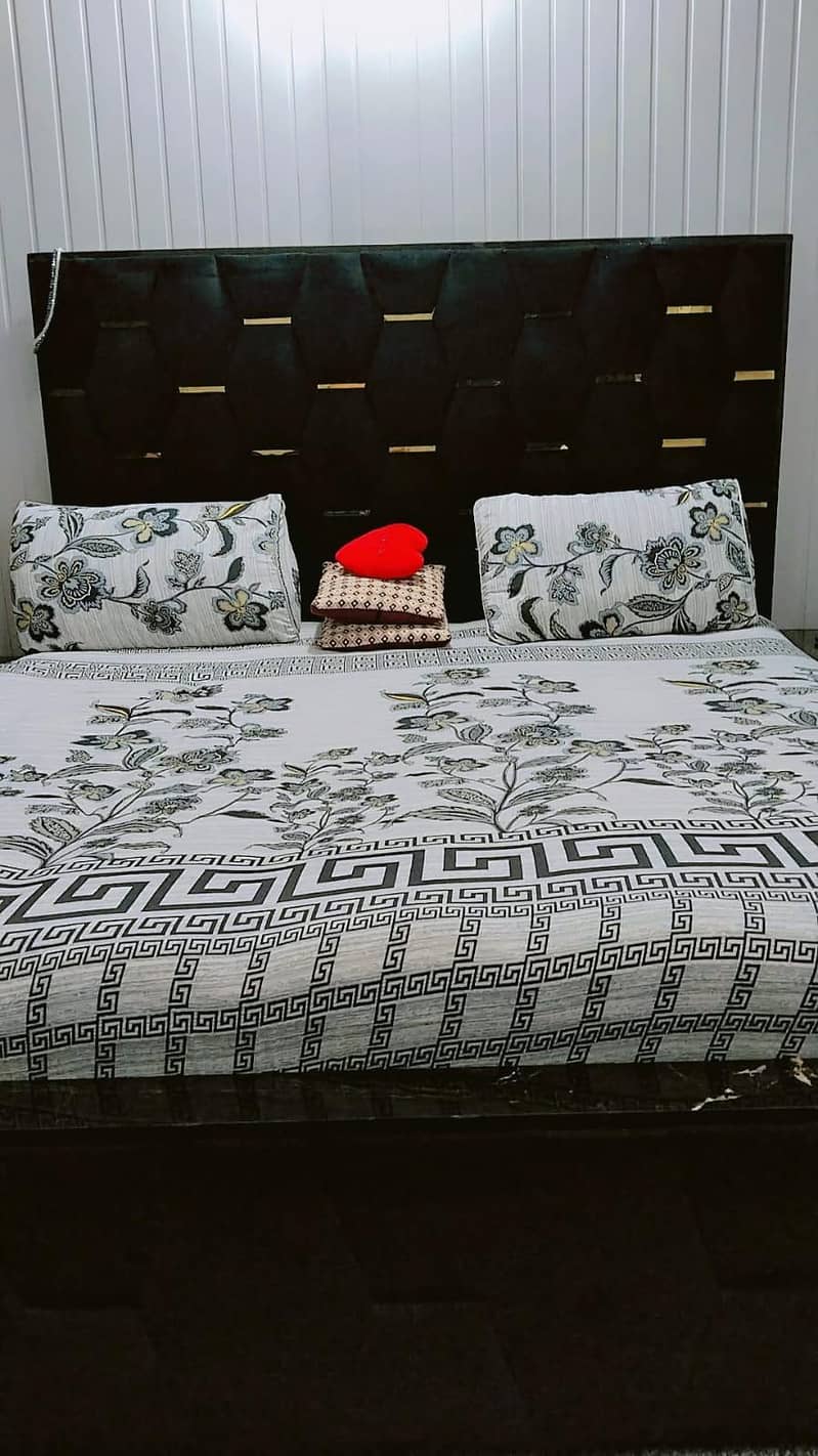 King size bed with side table 0