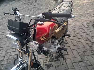 honda 125 self start gold edition price 2.85 lac