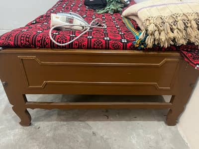 Single wooden bed
