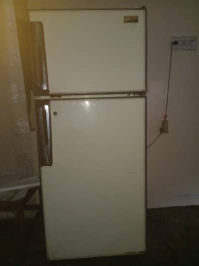 off white refrigerator in working condition