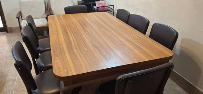 Dining table with 08 Rosewood (sheesham) chairs in good condition.
