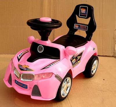 pink abs plastic kids car with royal themed design