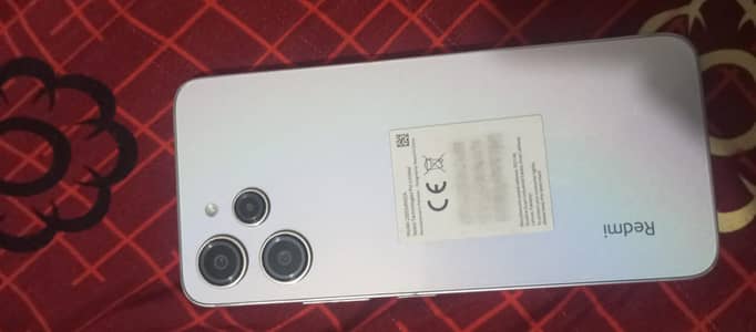 Redmi 12 8/256 1 hand use mobile