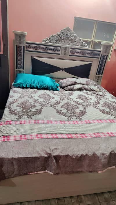 wooden double bed