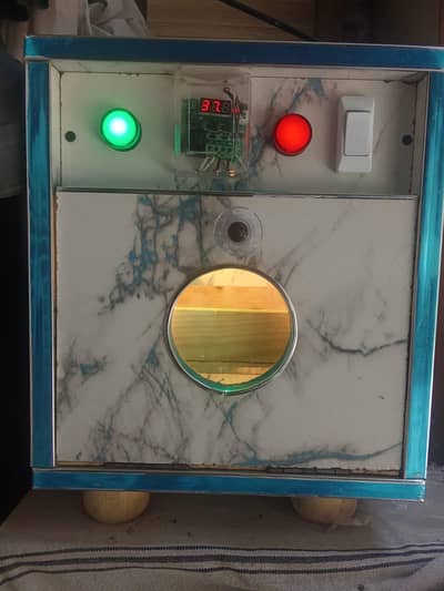 25 Eggs incubator machine full outomatic,AC,DC, 10 by 10 condition