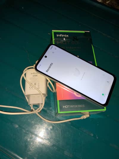 Infinix hot 60i box with chger 6 128 all ok