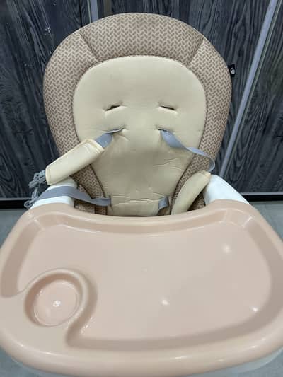 Almost new high chair for sale