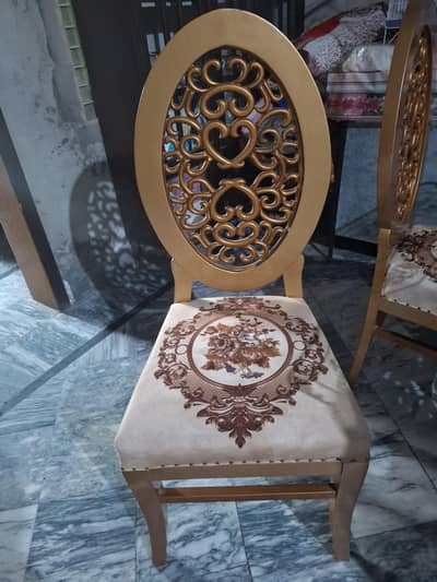 Wooden dining table with 6 chairs