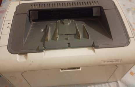 Little used HP LaserJet Pro M12a (wirh original box and accessories)
