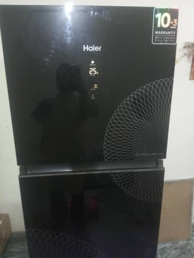 Glass door Digital inverter Haier in neat & Clean condition.