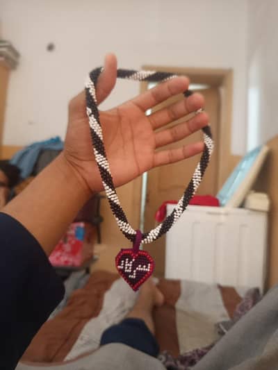 Handmade Beaded Necklace with Heart Pendant