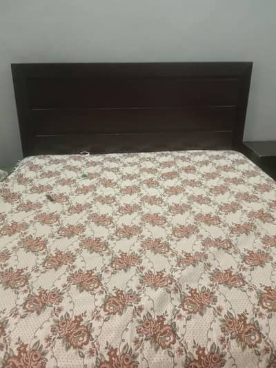 used bed set with side tables and dressing table.