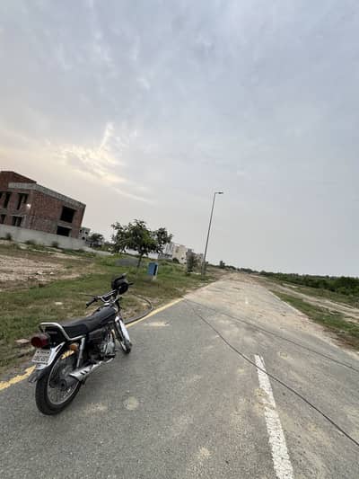 Lowest Rate Possession plot for sale Facing Green Belt DHA 9Town A block
