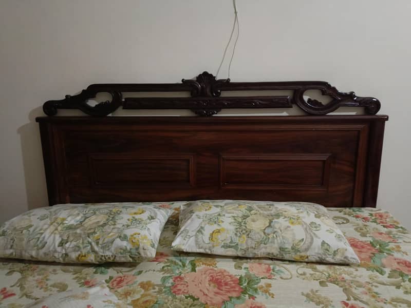 Solid wooden double bed Excellent condition ( bed only) 0